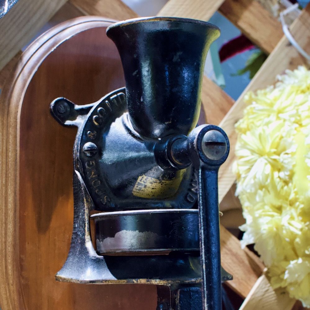 Wall mounted coffee grinder