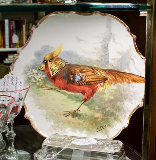 Limoges 10” diam. plate w/ hand painted bird.