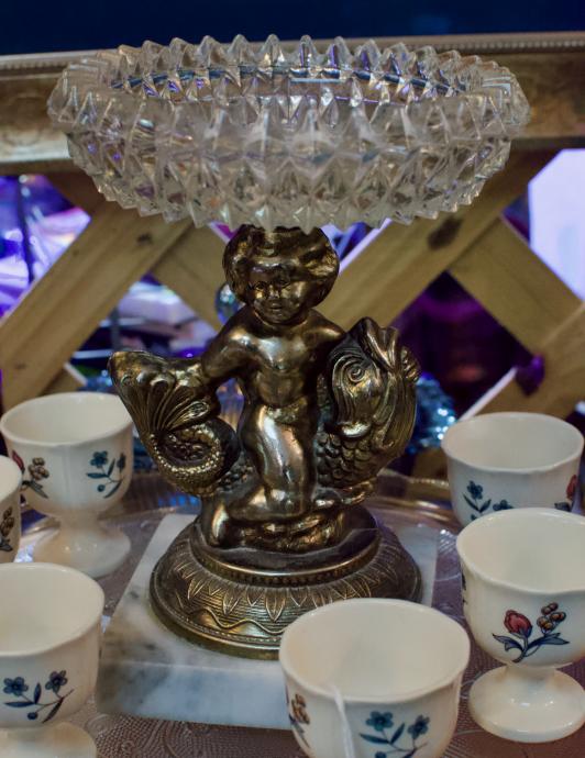 Vintage cherub / fish compote