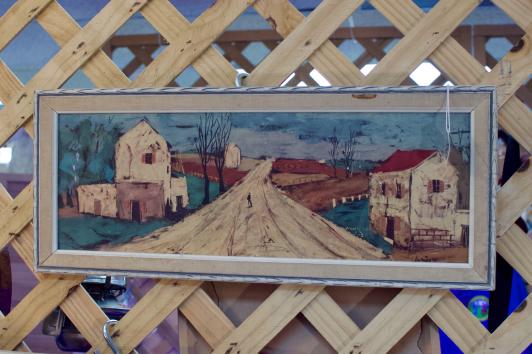 Picture - framed oblong of cottages w/ red roof