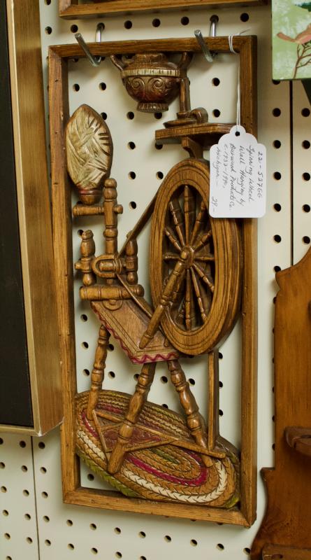Spinning wheel wall hanging