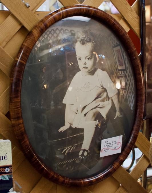 Baby boy portrait in oval frame