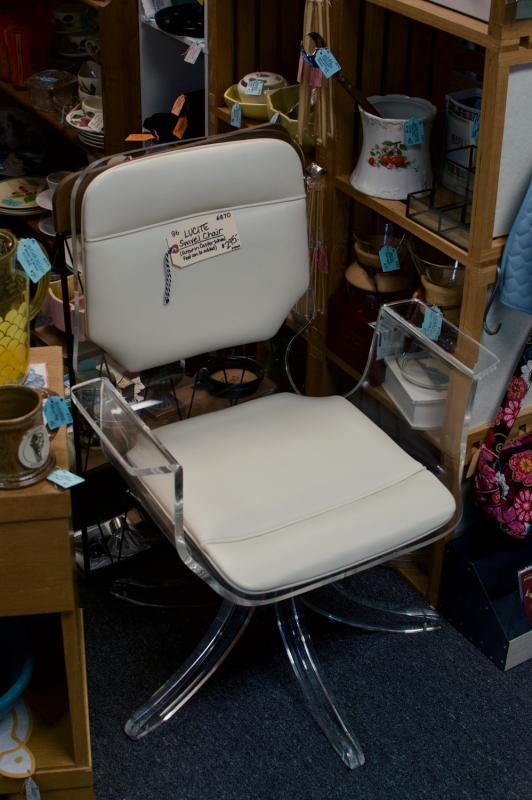 Lucite swivel chair