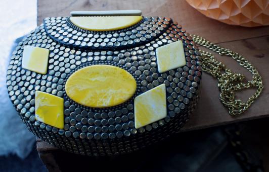 Brass studded mosaic purse