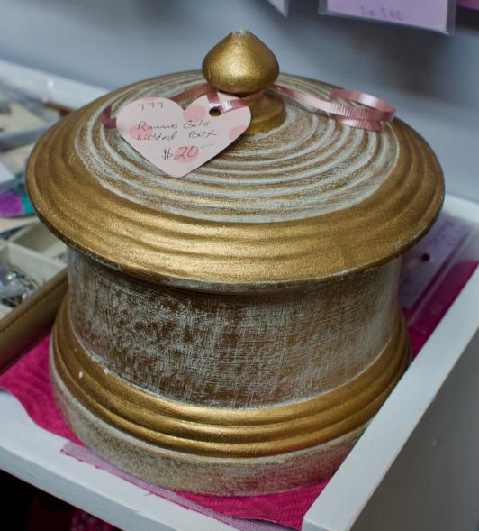 Round gold lidded box