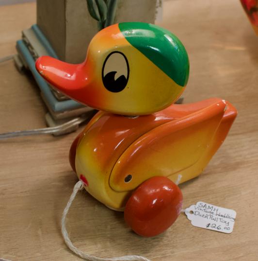Vintage waddling duck pull toy