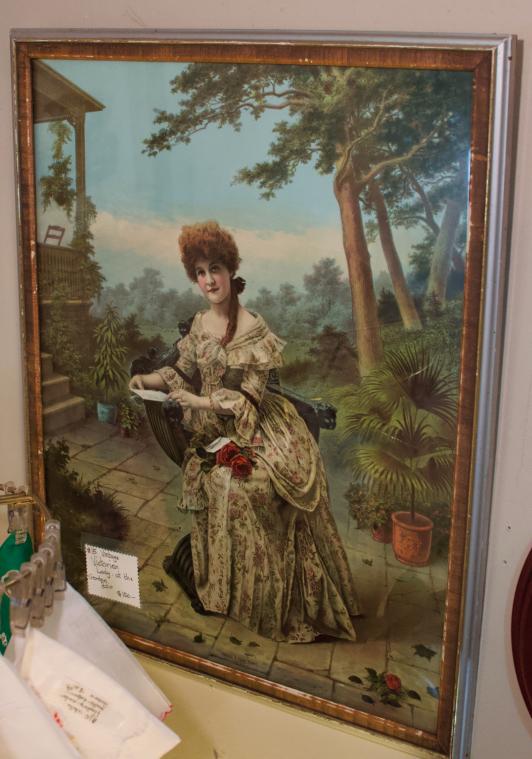 Vintage Victorian lady at the garden patio - framed print