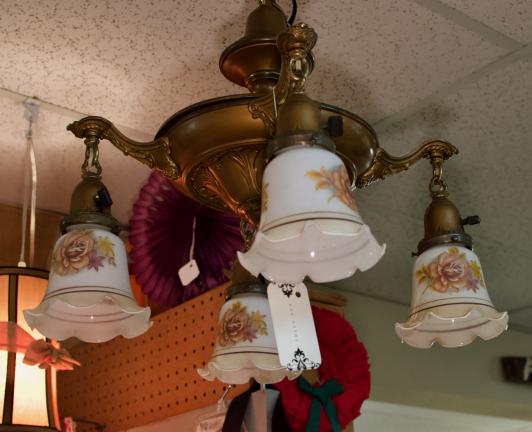 Brass chandelier w/ 4 milk glass floral bell lamp shades