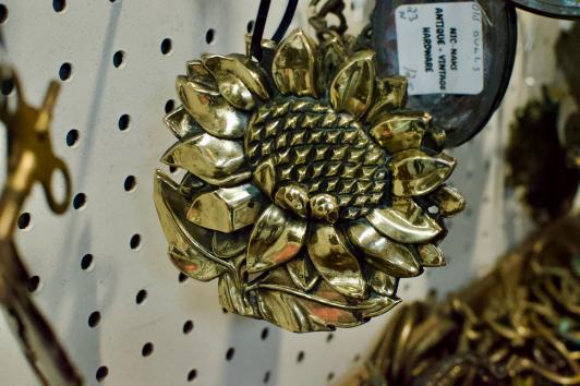 Gold toned metal sunflower