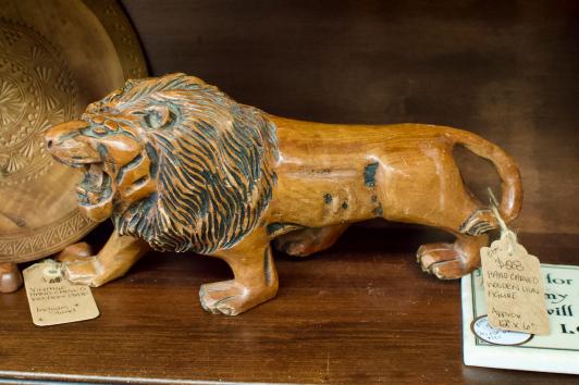 Hand carved wooden lion figure