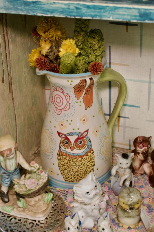 Dutch wax ceramic cast line pitcher. Owl & flowers