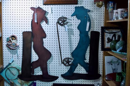 Metal cowboy & cowgirl pair