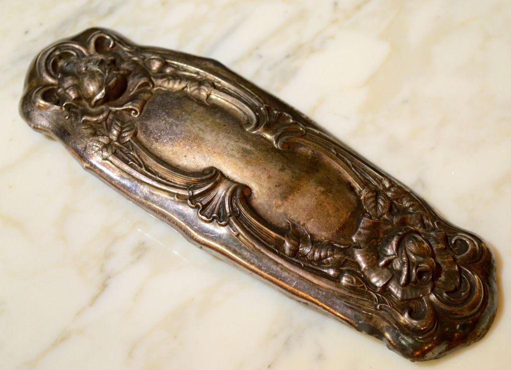 Brush Cover - would be nice hammered into a bracelet!